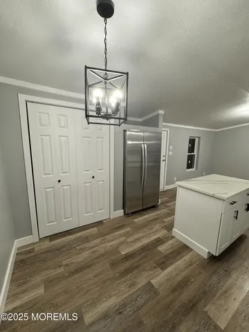 a view of a livingroom with a chandelier
