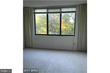 5225 Pooks Hill Road, Unit 620N Bethesda, MD 20814 - Photo 5 of 16 a view of an empty room with a window