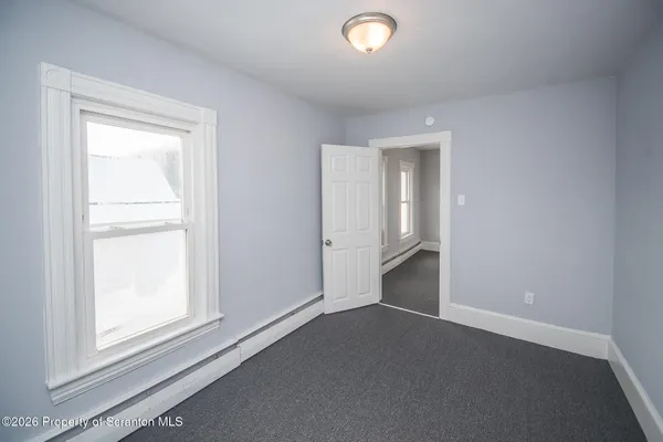 an empty room with a window