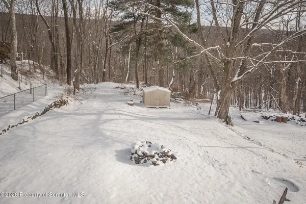 a view of a snow with a yard