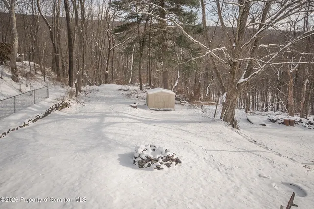 a view of a snow with a yard