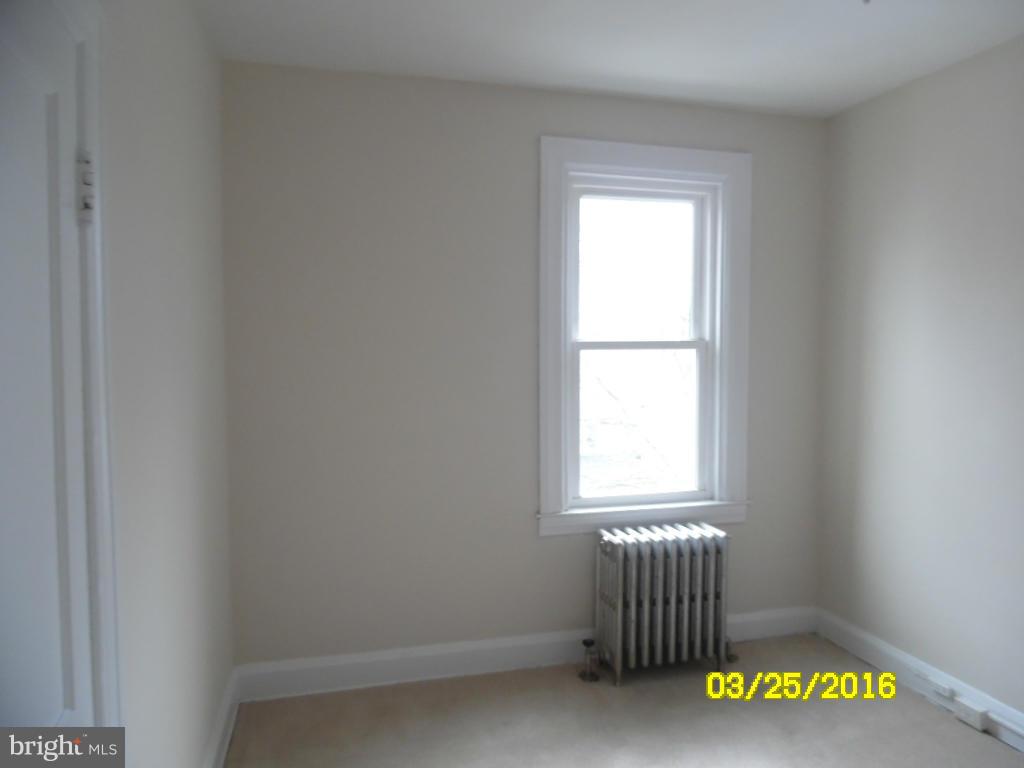 3003 Batavia Avenue Baltimore, MD 21214 - Photo 12 of 23 an empty room with a window