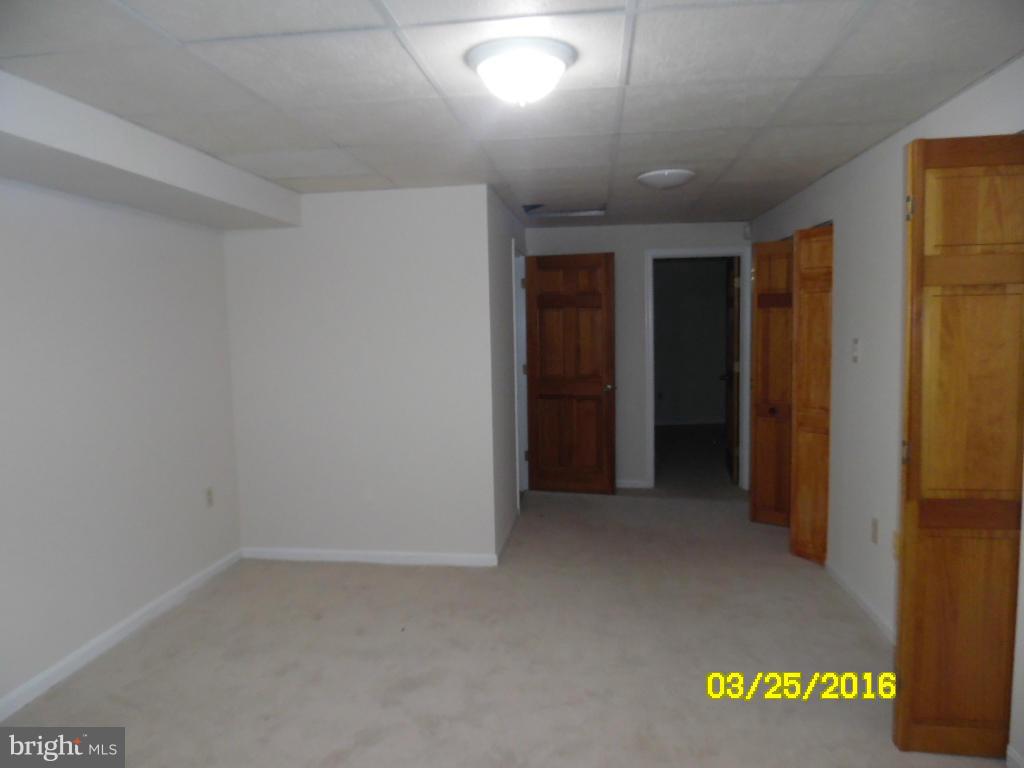 3003 Batavia Avenue Baltimore, MD 21214 - Photo 16 of 23 an empty room with a door