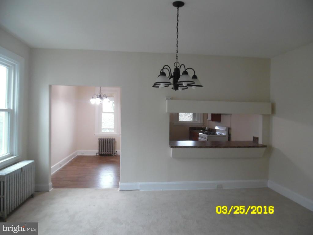 3003 Batavia Avenue Baltimore, MD 21214 - Photo 4 of 23 a view of a room with a chandelier