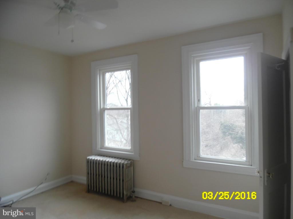 3003 Batavia Avenue Baltimore, MD 21214 - Photo 10 of 23 an empty room with windows
