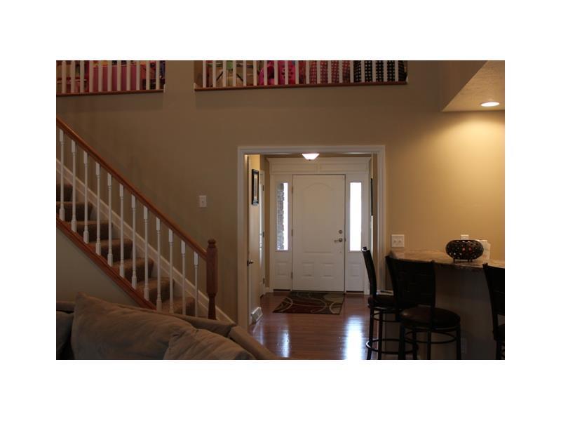 148 York Way Monaca, PA 15061 - Photo 6 of 25 Entry/Foyer. The entry way with the stairs that head up to the 27x12 loft that is currently used as a play room.