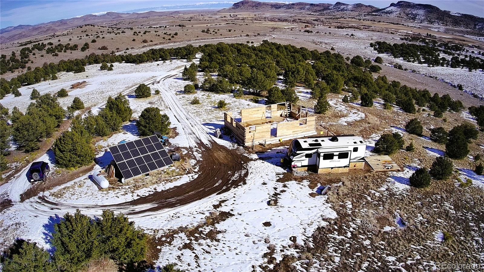 760 County Road East Del Norte, CO 81132 - Photo 2 of 20 an aerial view of residential houses with outdoor space