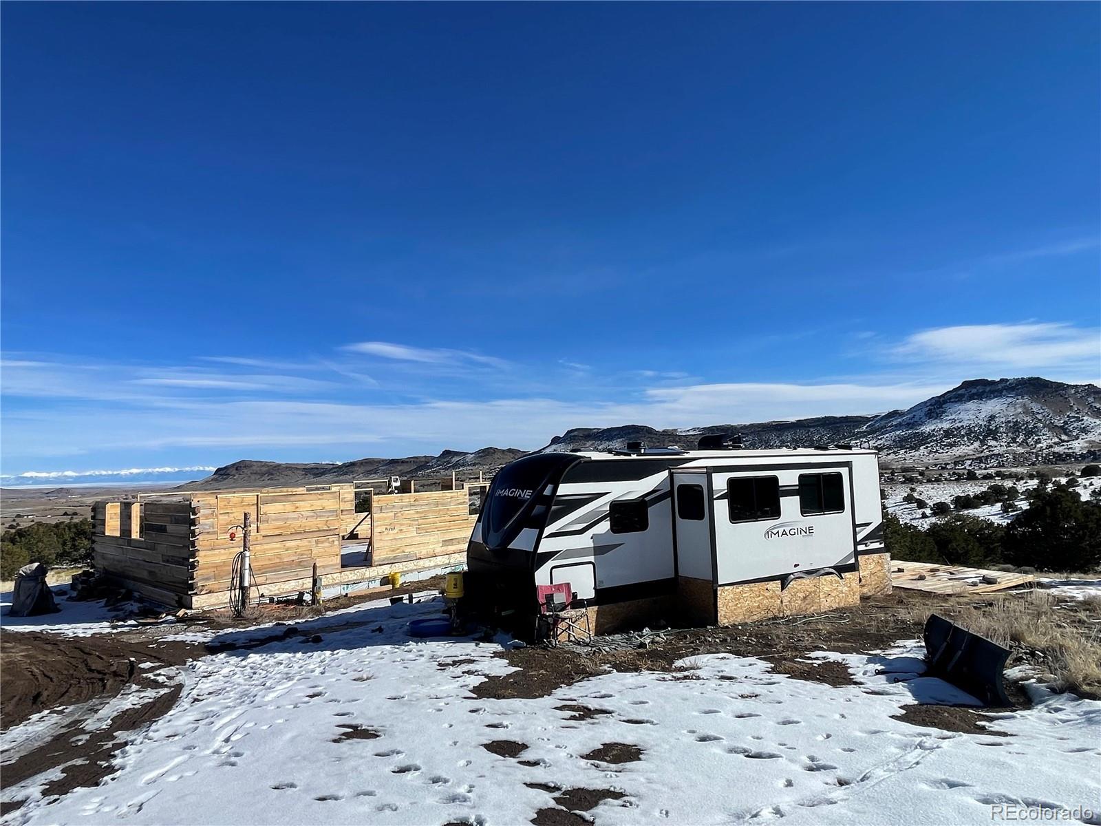 760 County Road East Del Norte, CO 81132 - Photo 10 of 20 a view of a parking space in front of a house