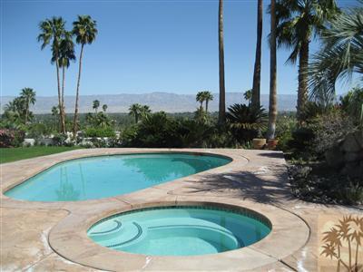 70248 Calico Road Rancho Mirage, CA 92270 - Photo 7 of 9 a view of swimming pool with a yard