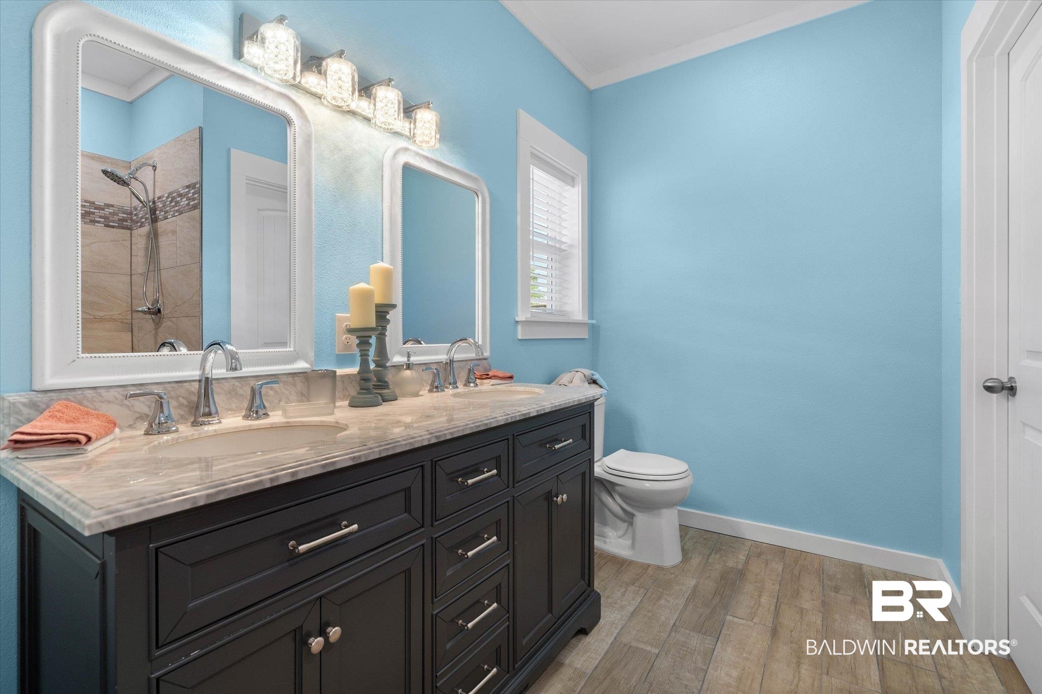 19878 Keller Road Foley, AL 36535 - Photo 15 of 35 Full bath with double vanity, wood finished floors, and ornamental molding