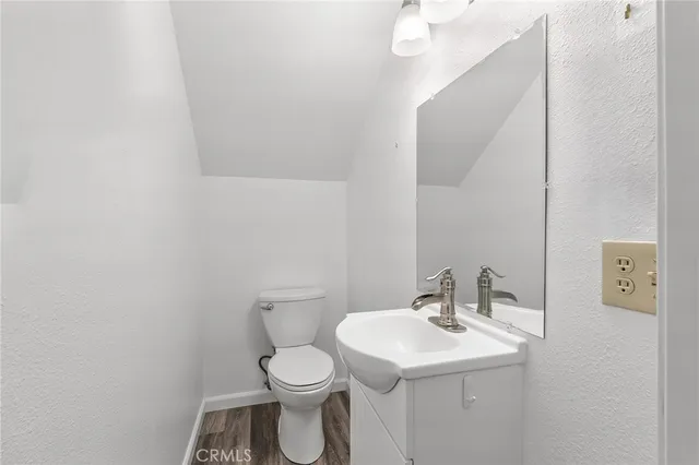 a view of a bathroom with toilet