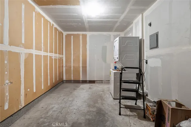 an aerial view of residential building and car parked