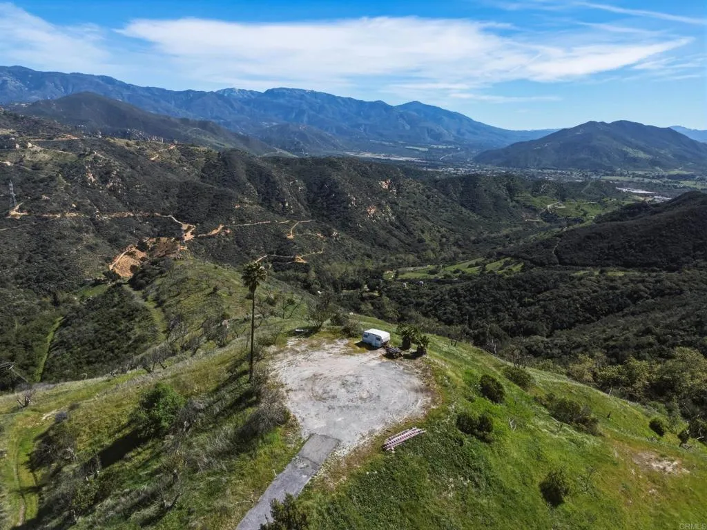 10148 Alex Fallbrook, CA 92028 - Photo 11 of 22 a view of a forest with mountains in the background