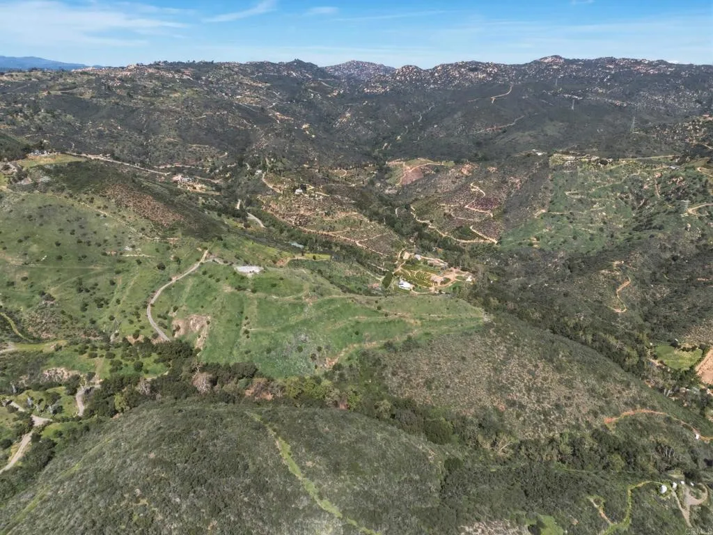 10148 Alex Fallbrook, CA 92028 - Photo 17 of 22 a view of a mountain in the distance in a field