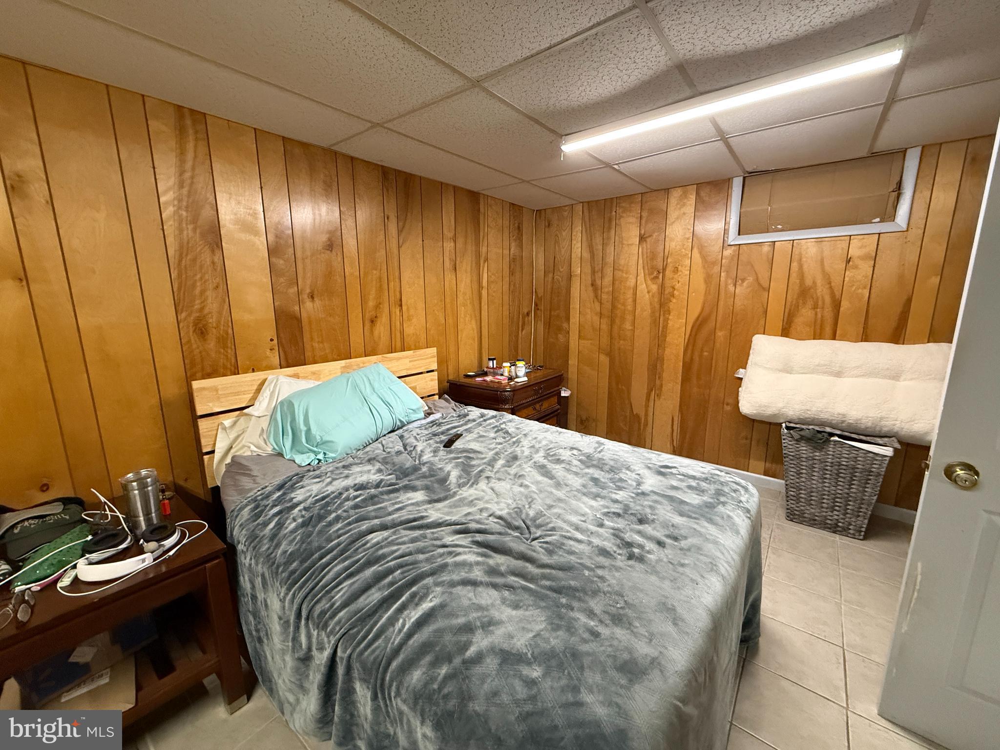1667 Beacon Hill Road Downingtown, PA 19335 - Photo 18 of 23 a bed sitting in a room next to a window