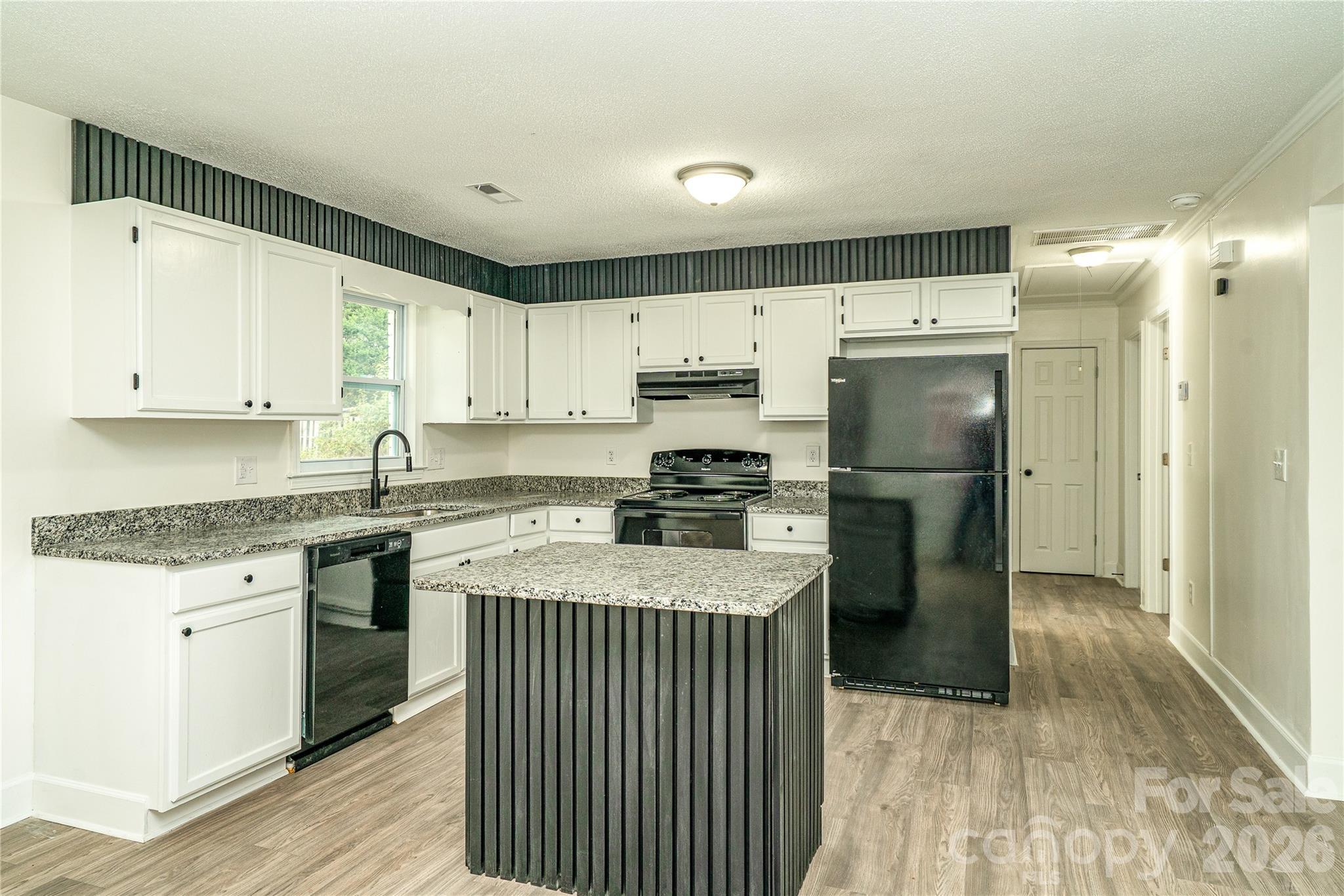 3115 Crestview Drive Florence, SC 29501 - Photo 19 of 35 a kitchen with a refrigerator a sink and dishwasher