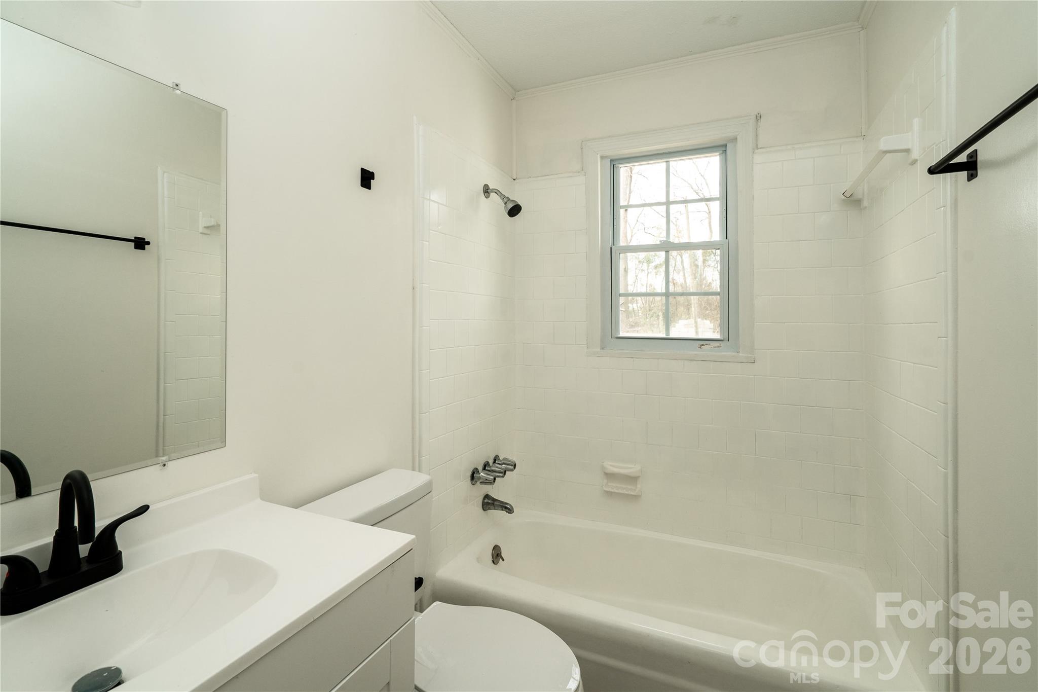 3115 Crestview Drive Florence, SC 29501 - Photo 21 of 35 a bathroom with a sink toilet vanity and bathtub