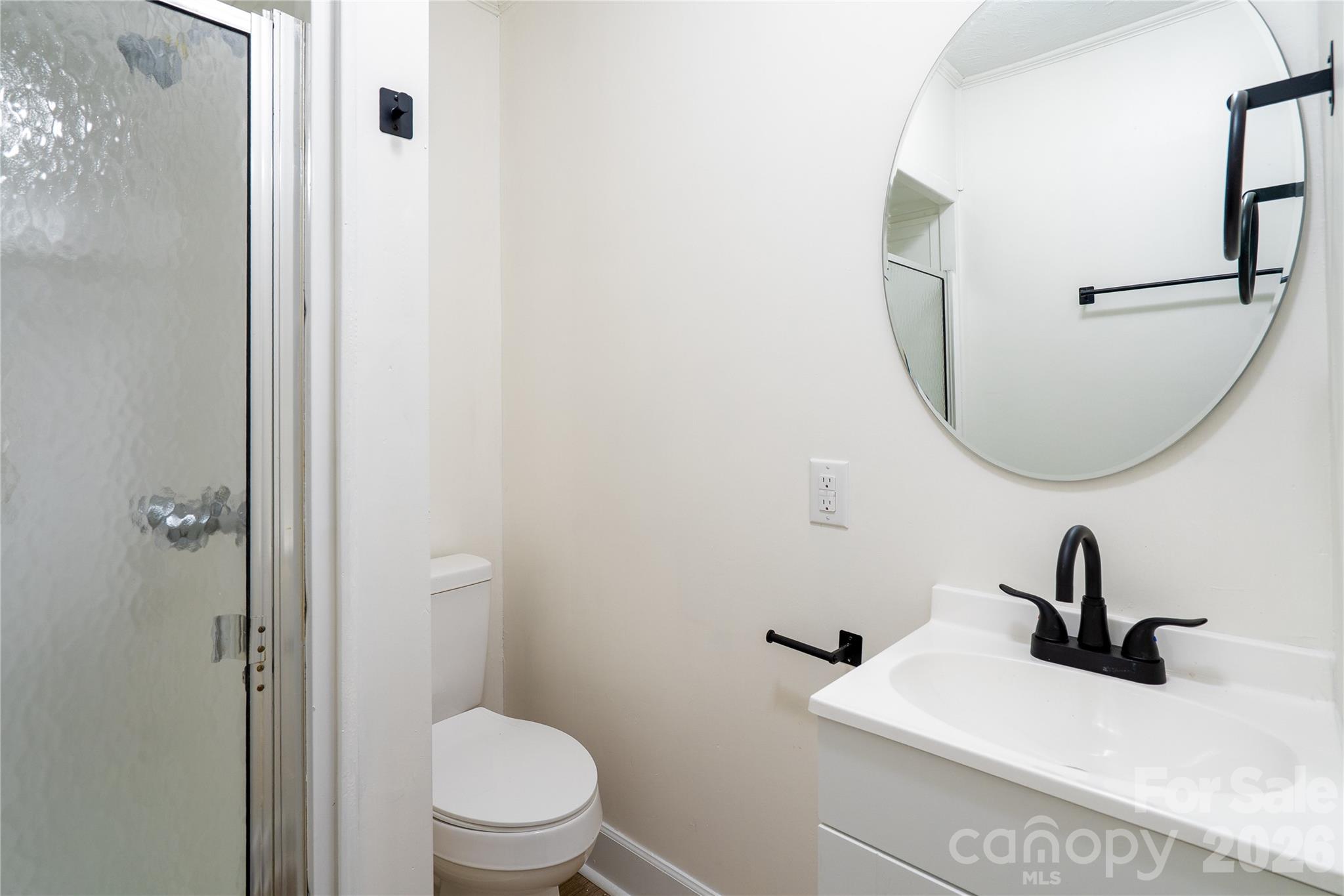3115 Crestview Drive Florence, SC 29501 - Photo 24 of 35 a bathroom with a sink and a mirror