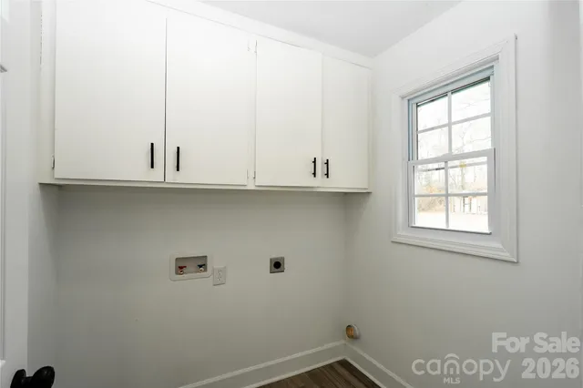 a backyard of a house with seating space