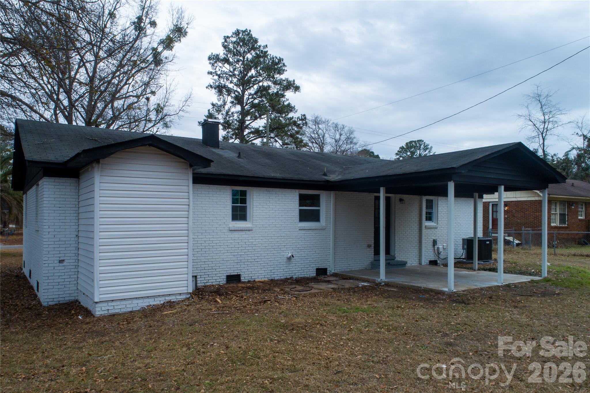 3115 Crestview Drive Florence, SC 29501 - Photo 33 of 35 a view of a house with a backyard