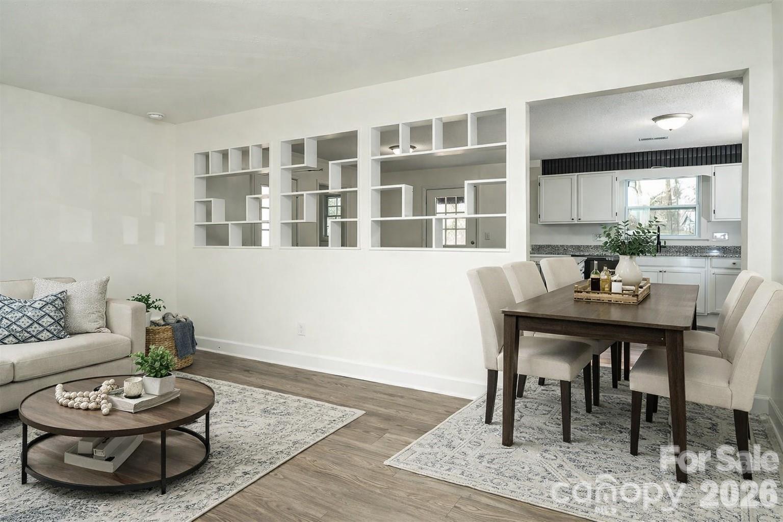 3115 Crestview Drive Florence, SC 29501 - Photo 6 of 35 a living room with furniture and a wooden floor