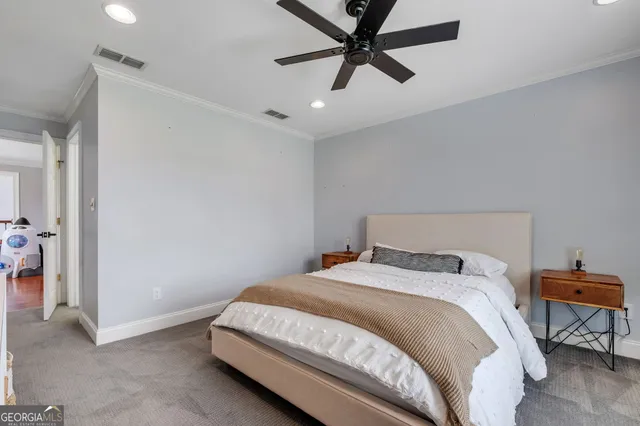 a bathroom with a shower and a toilet