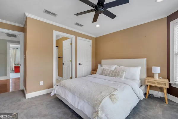 a bathroom with a shower and a toilet