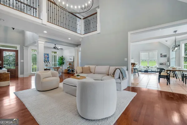 a kitchen with granite countertop a sink cabinets and stainless steel appliances
