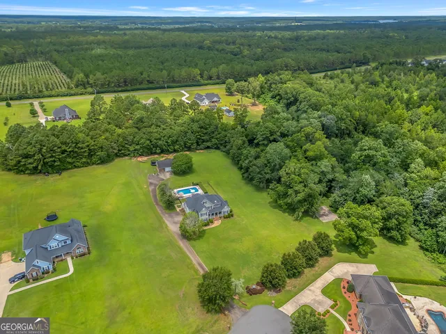 a view of a lake with a yard