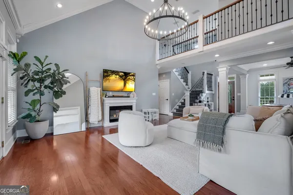 a kitchen with stainless steel appliances granite countertop a refrigerator and a stove