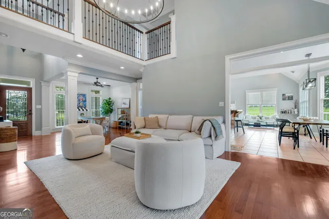 a kitchen with stainless steel appliances granite countertop a refrigerator and a stove