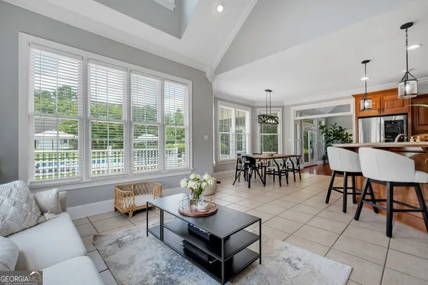 a view of a swimming pool and a yard