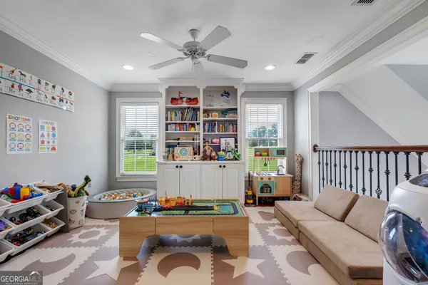 a a spacious bedroom with a bed and a couch