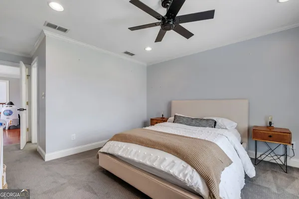 a bed room with furniture and a window