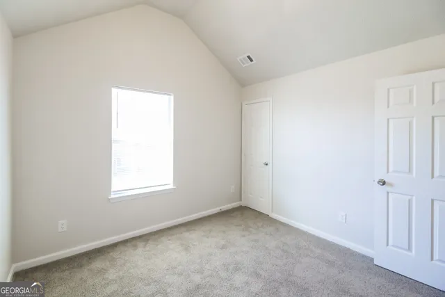 an empty room with a window
