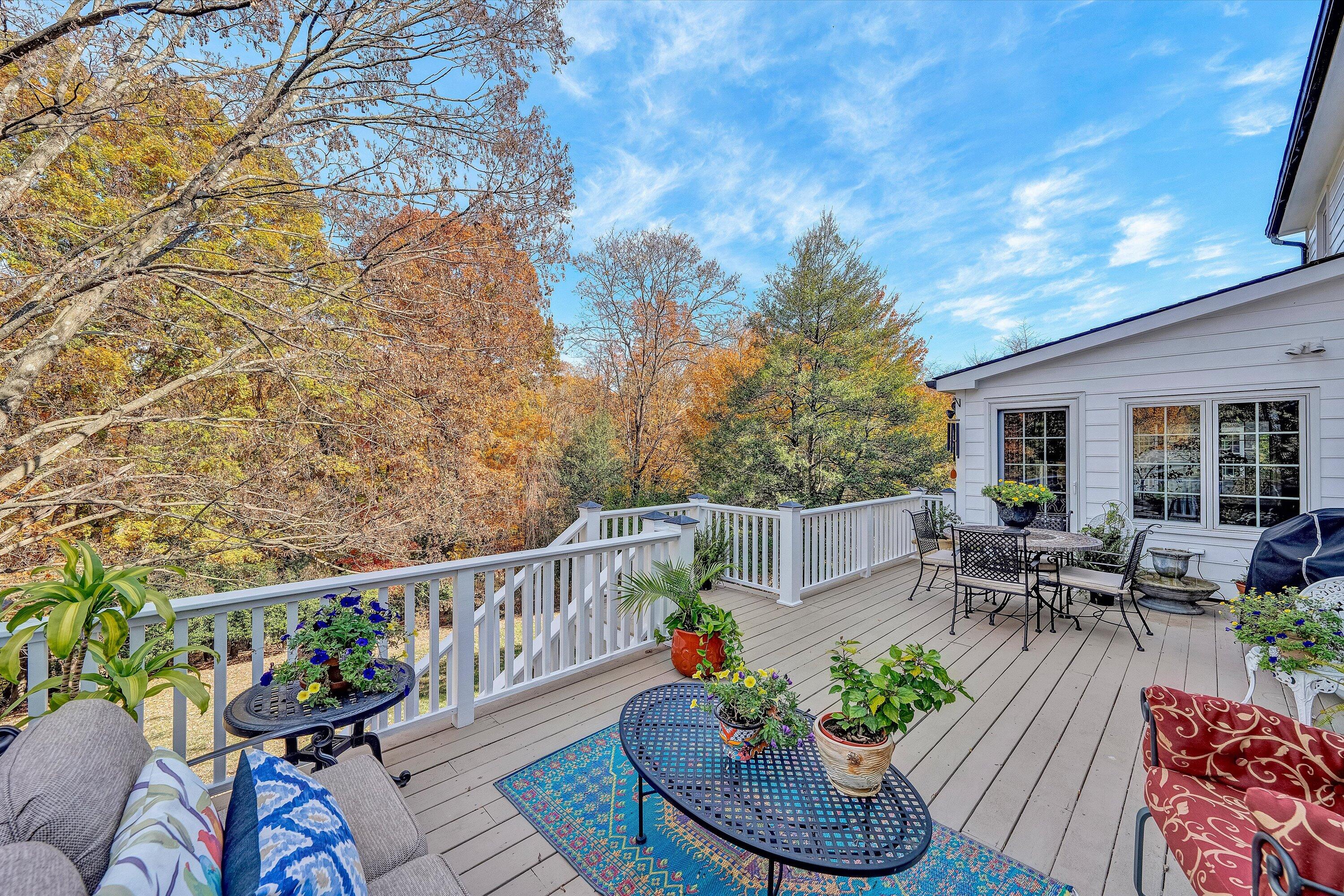 727 White Oak Road Southwest Roanoke, VA 24014 - Photo 51 of 52 a view of a patio with couches table and chairs and potted plants