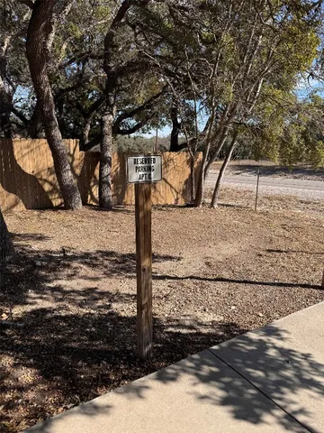a view of a road with an trees