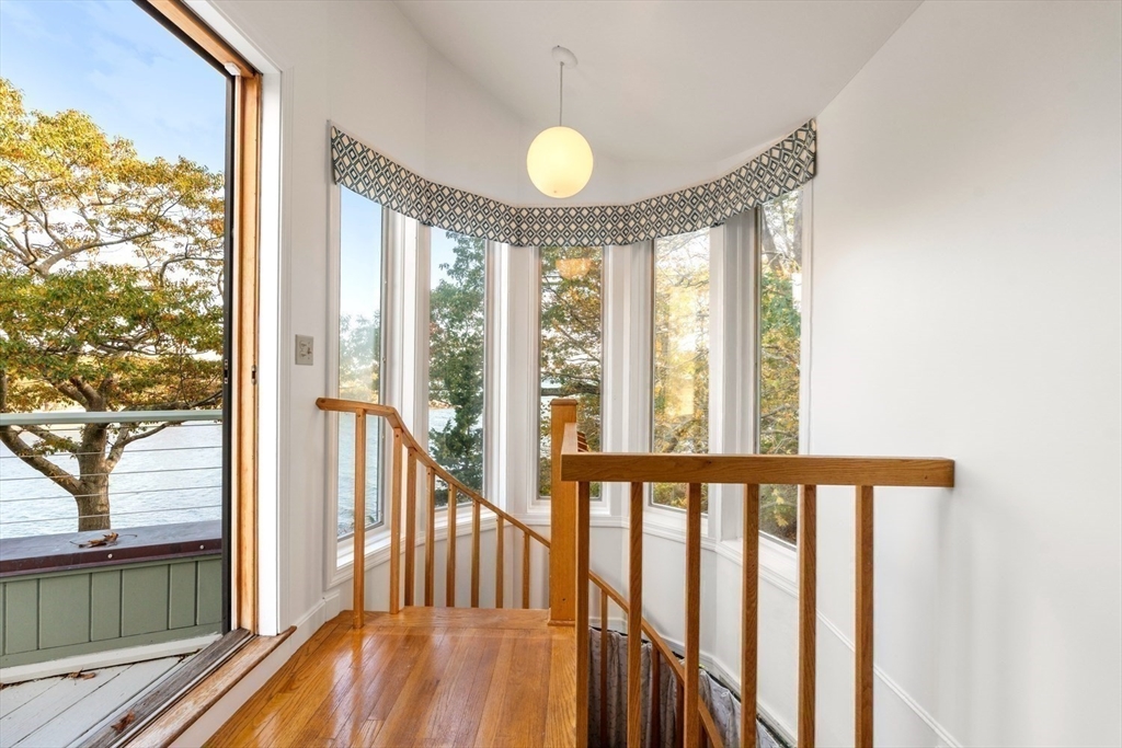 23 Ocean Street Manchester, MA 01944 - Photo 11 of 22 a view of a large window with wooden floor