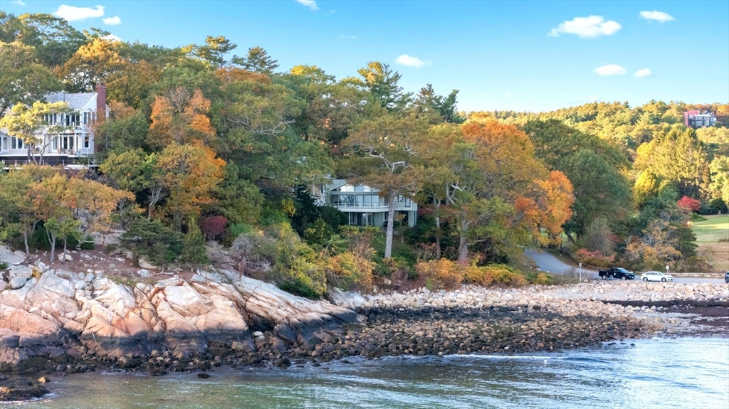 23 Ocean Street Manchester, MA 01944 - Photo 7 of 23 a view of a house with a yard