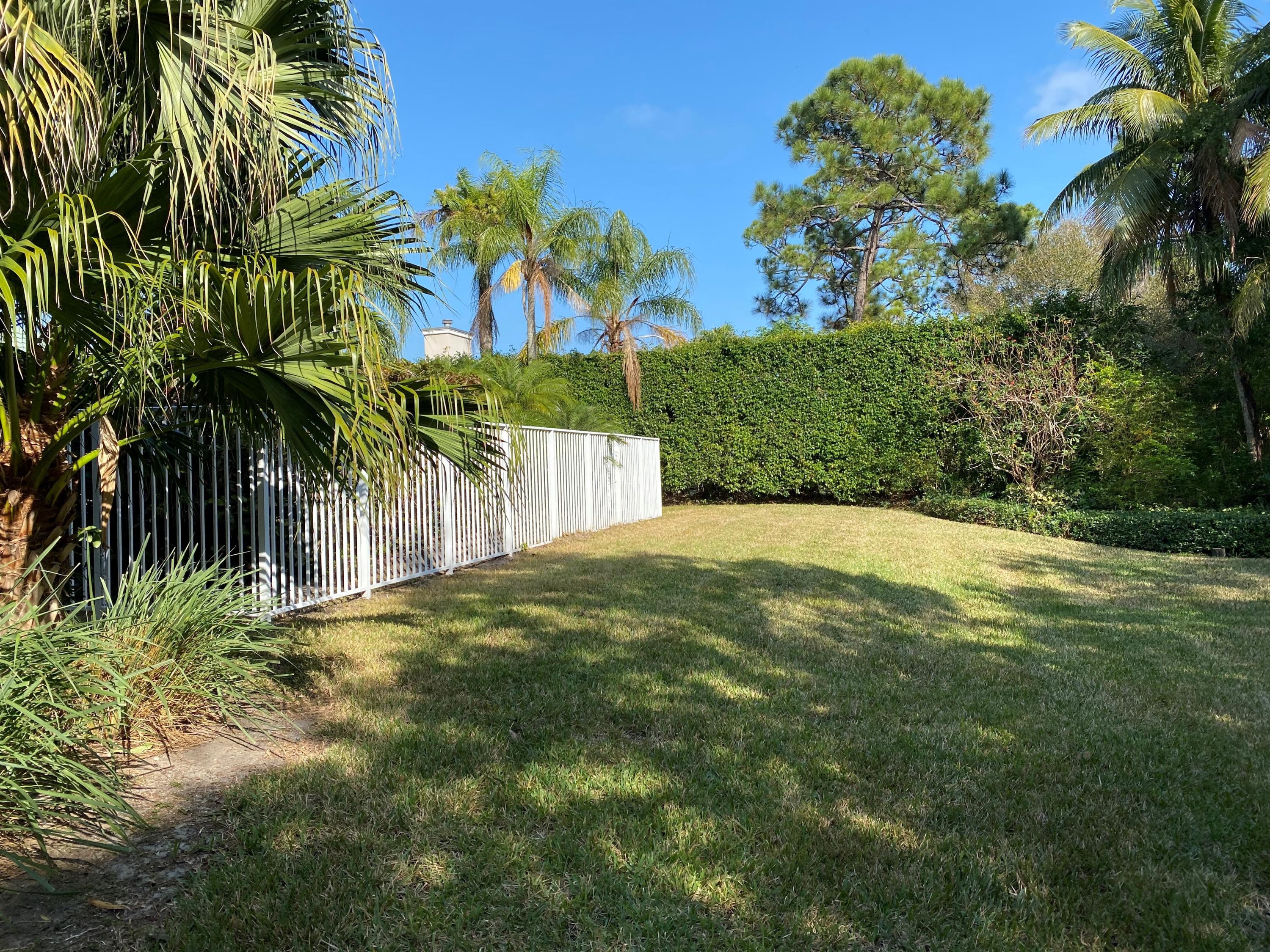 5900 Our Robbies Road Jupiter, FL 33458 - Photo 14 of 53 a view of a yard with a house