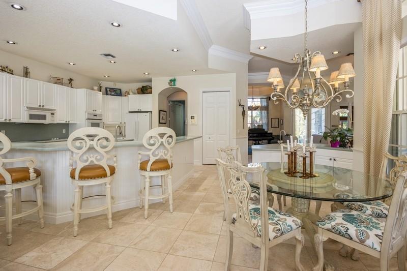 5900 Our Robbies Road Jupiter, FL 33458 - Photo 27 of 53 a view of kitchen and dining area with furniture