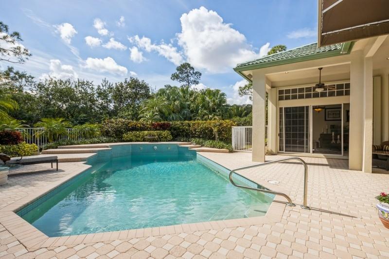 5900 Our Robbies Road Jupiter, FL 33458 - Photo 29 of 53 a view of a house with swimming pool and sitting area