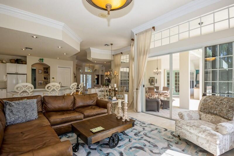 5900 Our Robbies Road Jupiter, FL 33458 - Photo 36 of 53 a living room with furniture and a large window