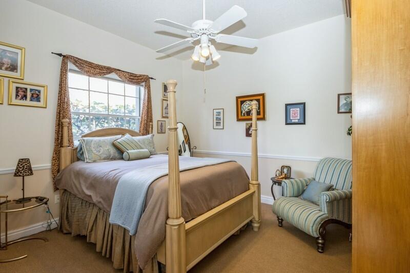 5900 Our Robbies Road Jupiter, FL 33458 - Photo 39 of 53 a bedroom with a bed couches and window