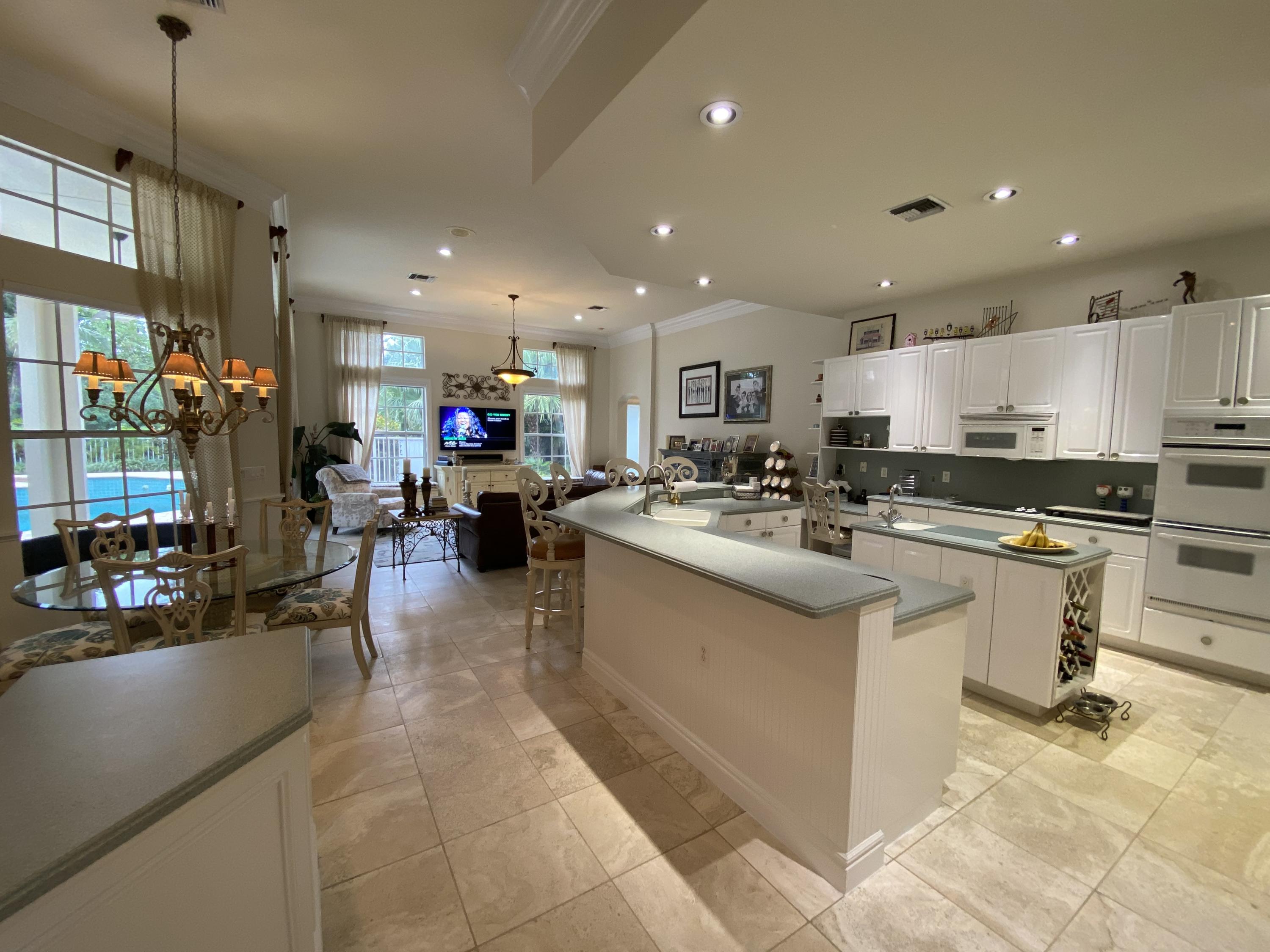 5900 Our Robbies Road Jupiter, FL 33458 - Photo 6 of 53 a kitchen with lots of counter top space