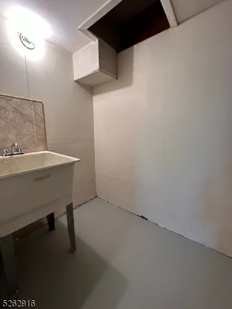 a room with a table and chairs