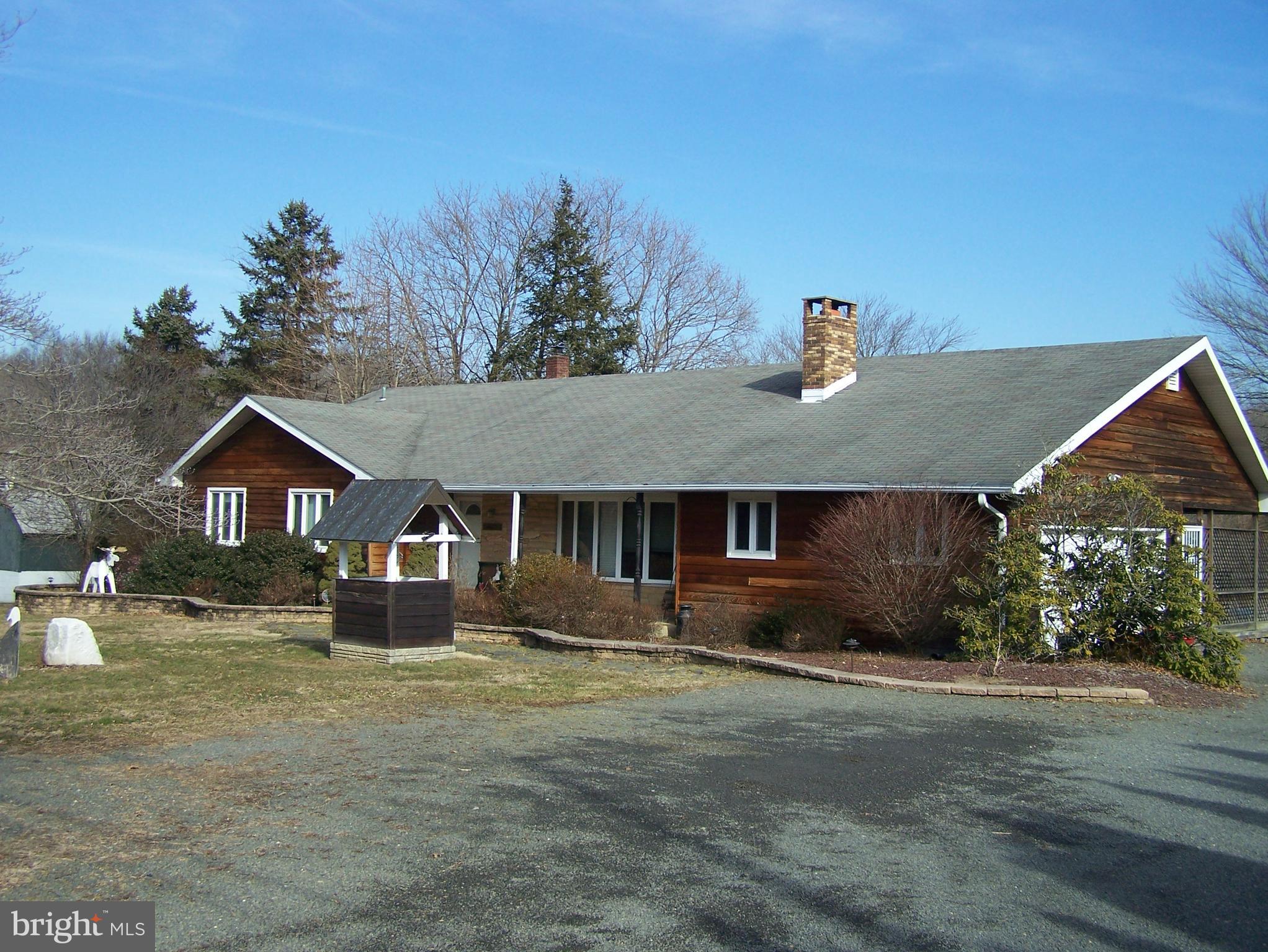 215 Windsor Road Robbinsville, NJ 08691 - Photo 1 of 34 front view of house with a yard