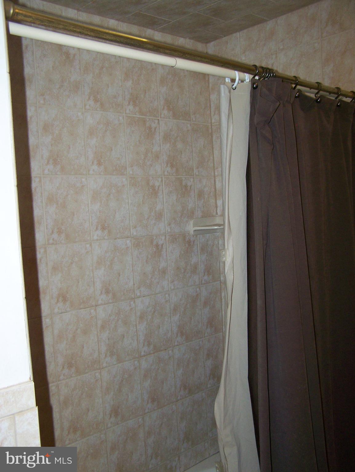 215 Windsor Road Robbinsville, NJ 08691 - Photo 19 of 34 a bathroom with a shower and a sink