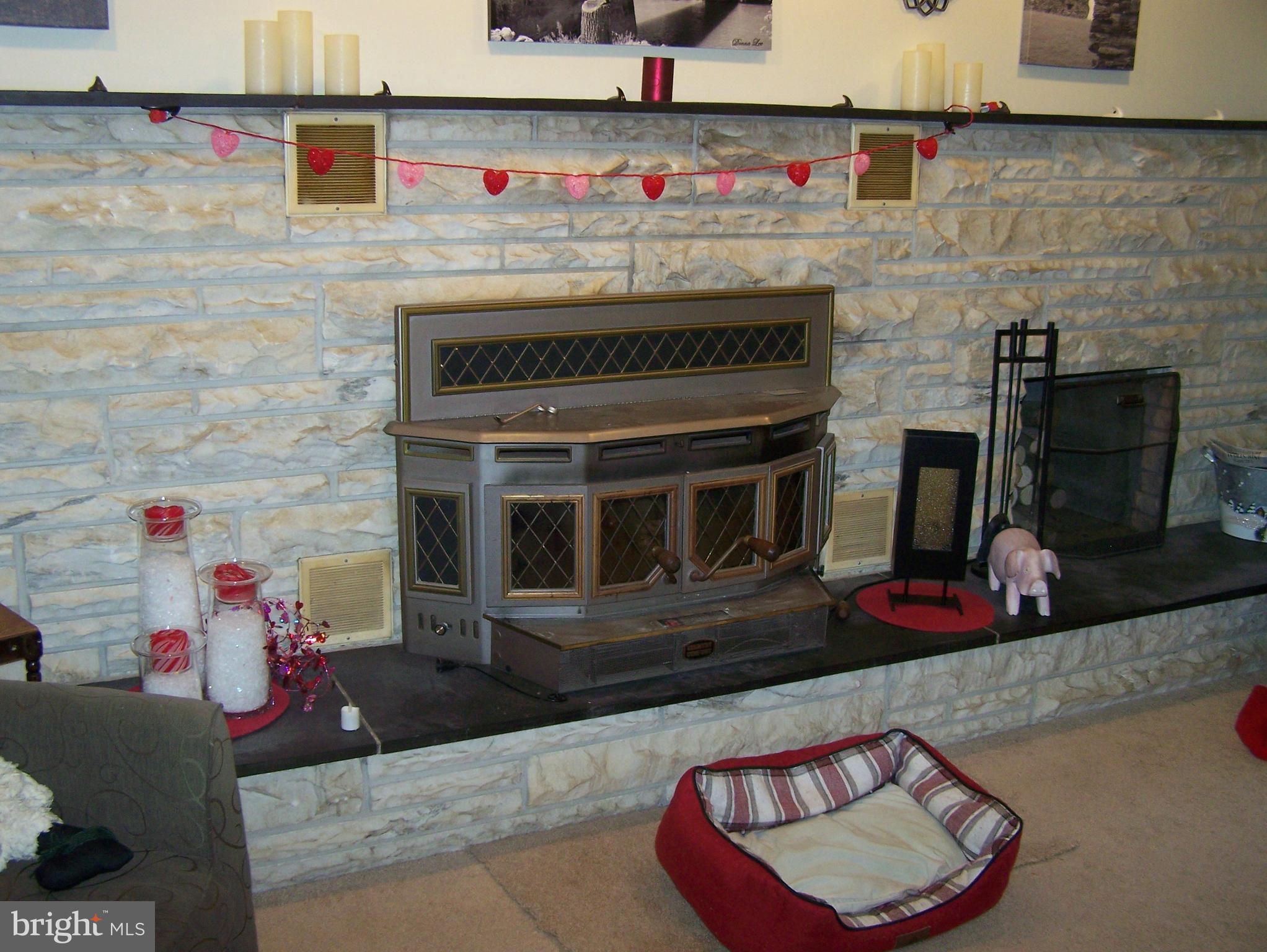 215 Windsor Road Robbinsville, NJ 08691 - Photo 3 of 34 a living room with furniture and a fireplace