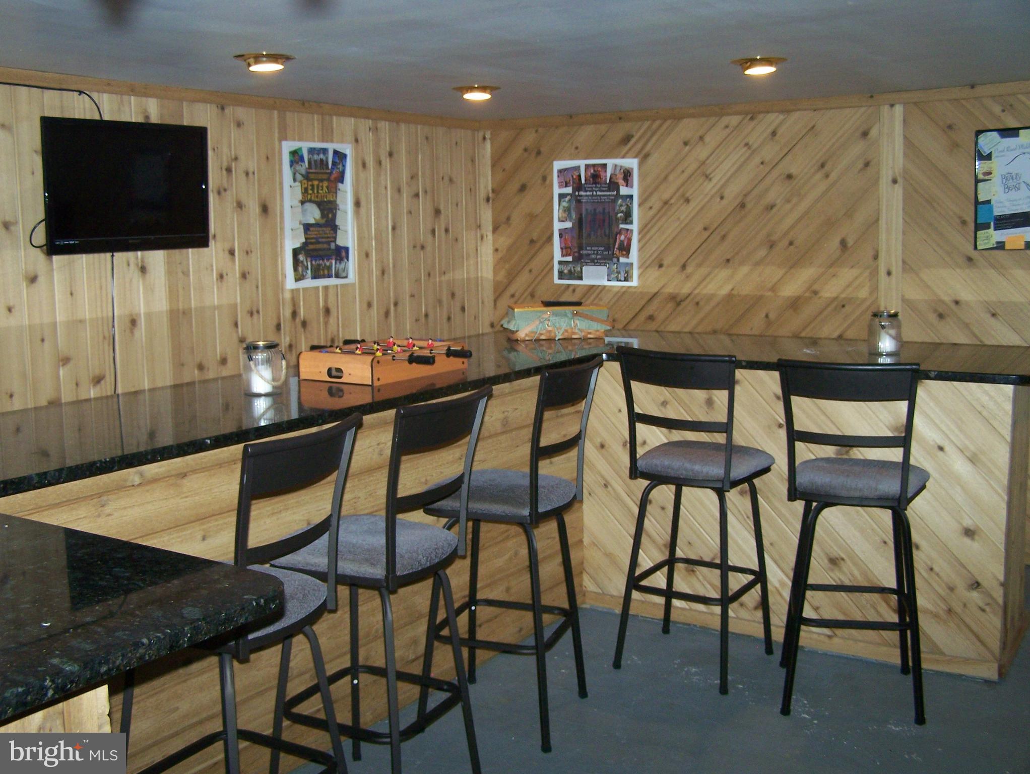 215 Windsor Road Robbinsville, NJ 08691 - Photo 22 of 34 a dining room with furniture and a flat screen tv